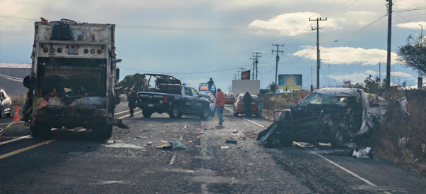 Comerciante pierse la vida al chocar contra camion de basura